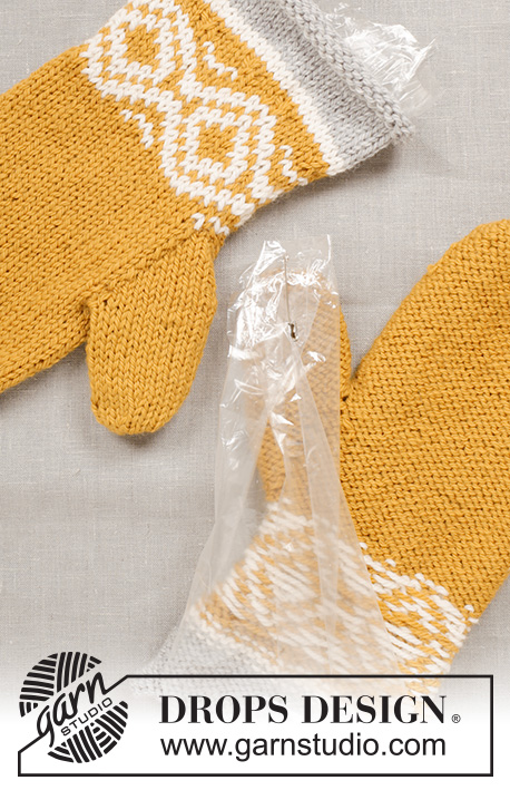 Touch of Gold / DROPS Extra 0-1245 - DROPS Easter: Knitted and felted DROPS mittens for men and women with Nordic pattern in ”Alaska”.