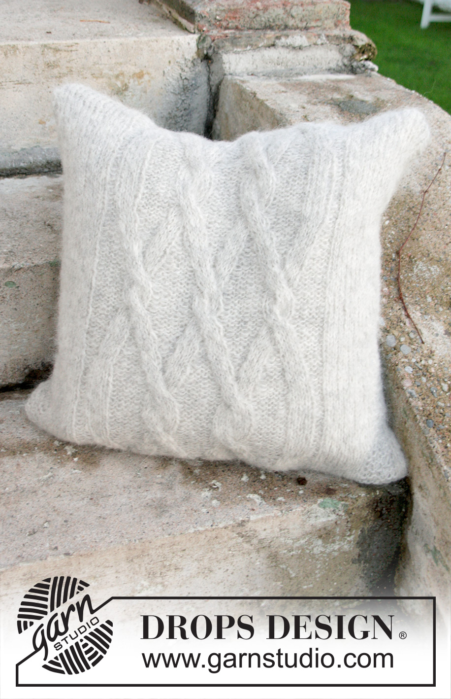 Diamond Bliss Pillow / DROPS Extra 0-1313 - Knitted pillow case with cables in DROPS Air.