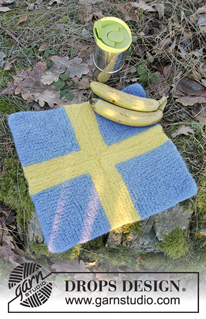 DROPS Extra 0-1360 - Gestrickte und gefilzte Sitzauflage mit Dominoquadraten in DROPS Snow.