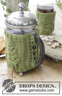 Christmas Brew / DROPS Extra 0-1402 - DROPS Christmas: Knitted cover with cables for press pot and cup. Piece is knitted in DROPS Lima.