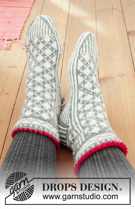 Tip Toe Santa / DROPS Extra 0-1433 - Knitted socks in DROPS Karisma. The piece is worked with Nordic pattern. Sizes 35 - 43. Theme: Christmas.