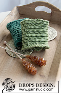 Christmas Shots / DROPS Extra 0-1461 - Knitted cup-cosy in DROPS Merino Extra Fine. The piece is worked in Fisherman’s rib. Theme: Christmas.