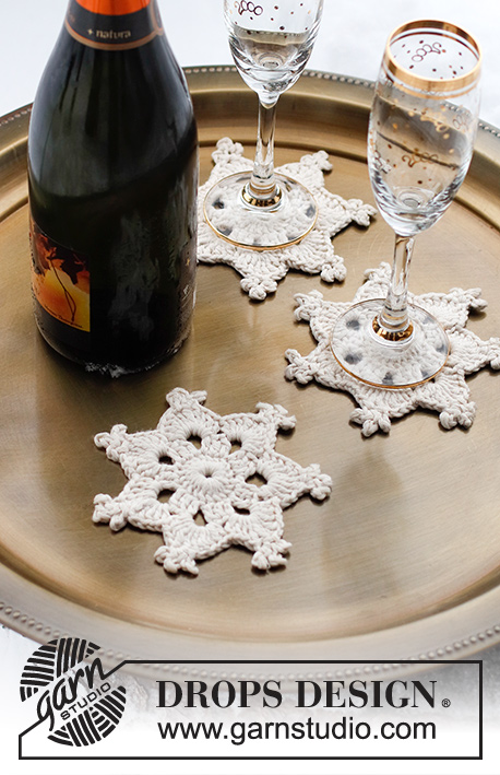 Cheers! / DROPS Extra 0-1566 - Gehaakte onderzetter in de vorm van een ster in DROPS Paris. Thema: Kerst.
