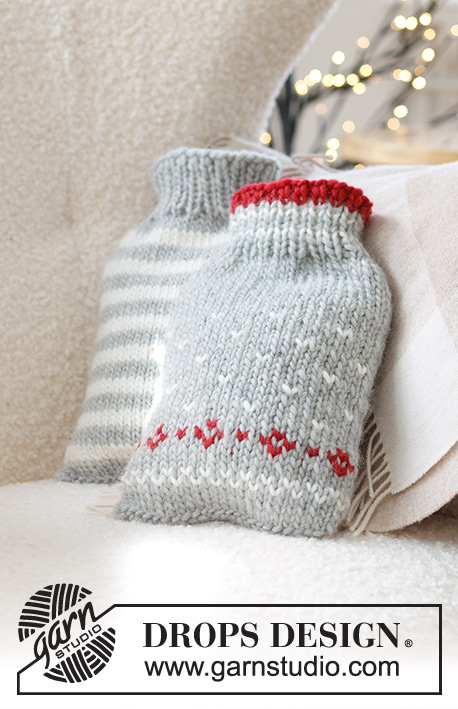 Christmas Sparkle Hot Bottle Cover / DROPS Extra 0-1582 - Gestrickter Wärmflaschenbezug / Bezug für Wärmflaschen in DROPS Snow. Die Arbeit wird von unten nach oben mit Streifen oder nordischem Muster gestrickt. Thema: Weihnachten.