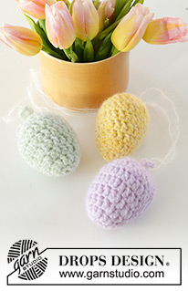 Easter Eggs / DROPS Extra 0-1596 - Velikonoční vajíčko háčkované v kruhových řadách zdola nahoru z příze DROPS Air. Motiv: Velikonoce.