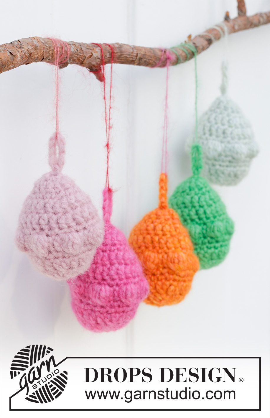 Easter Eggs / DROPS Extra 0-1597 - Crocheted Easter eggs in DROPS Air. Piece is worked in the round top down with bobbles. Theme: Easter.