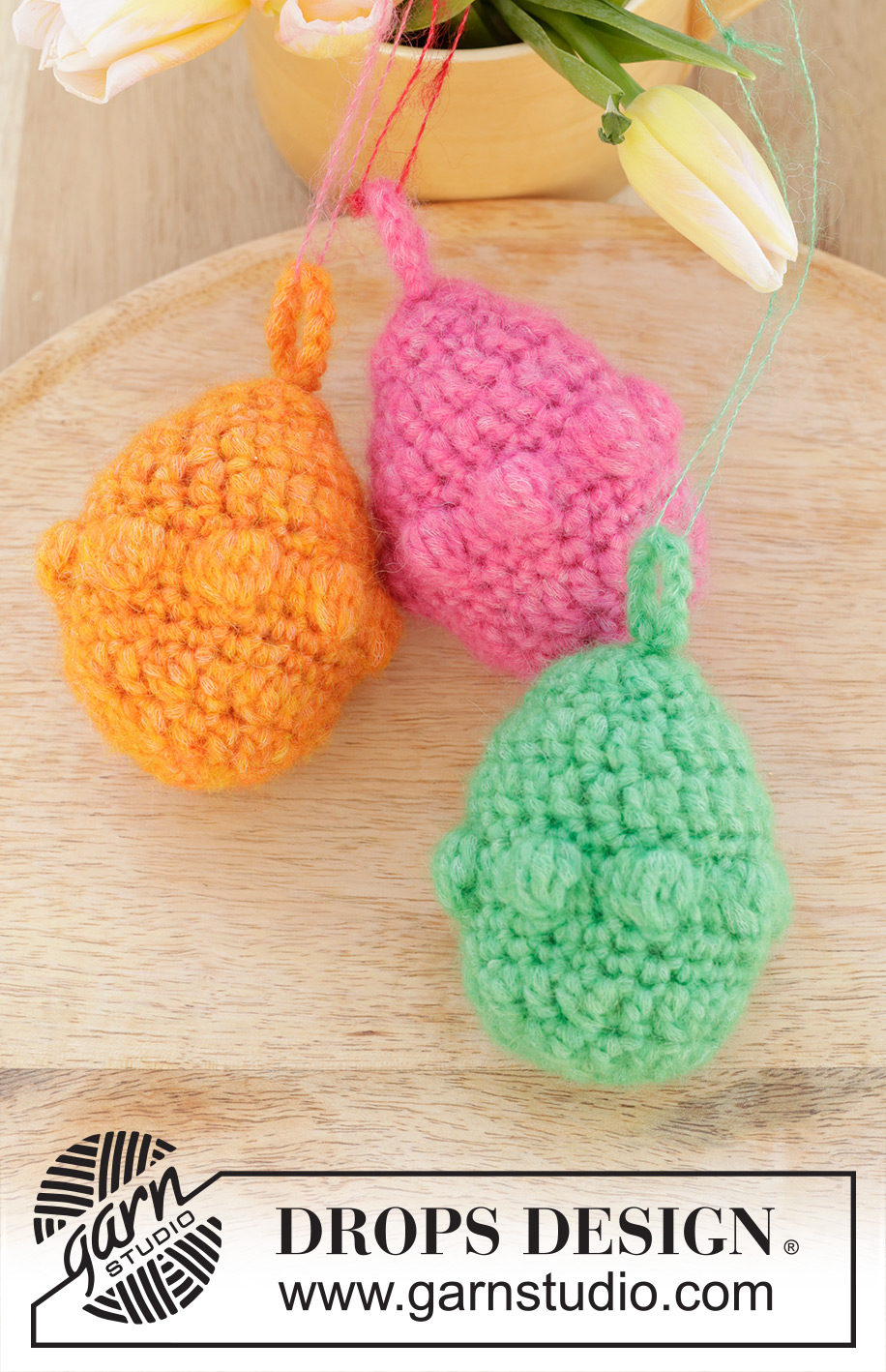 Easter Eggs / DROPS Extra 0-1597 - Crocheted Easter eggs in DROPS Air. Piece is worked in the round top down with bobbles. Theme: Easter.