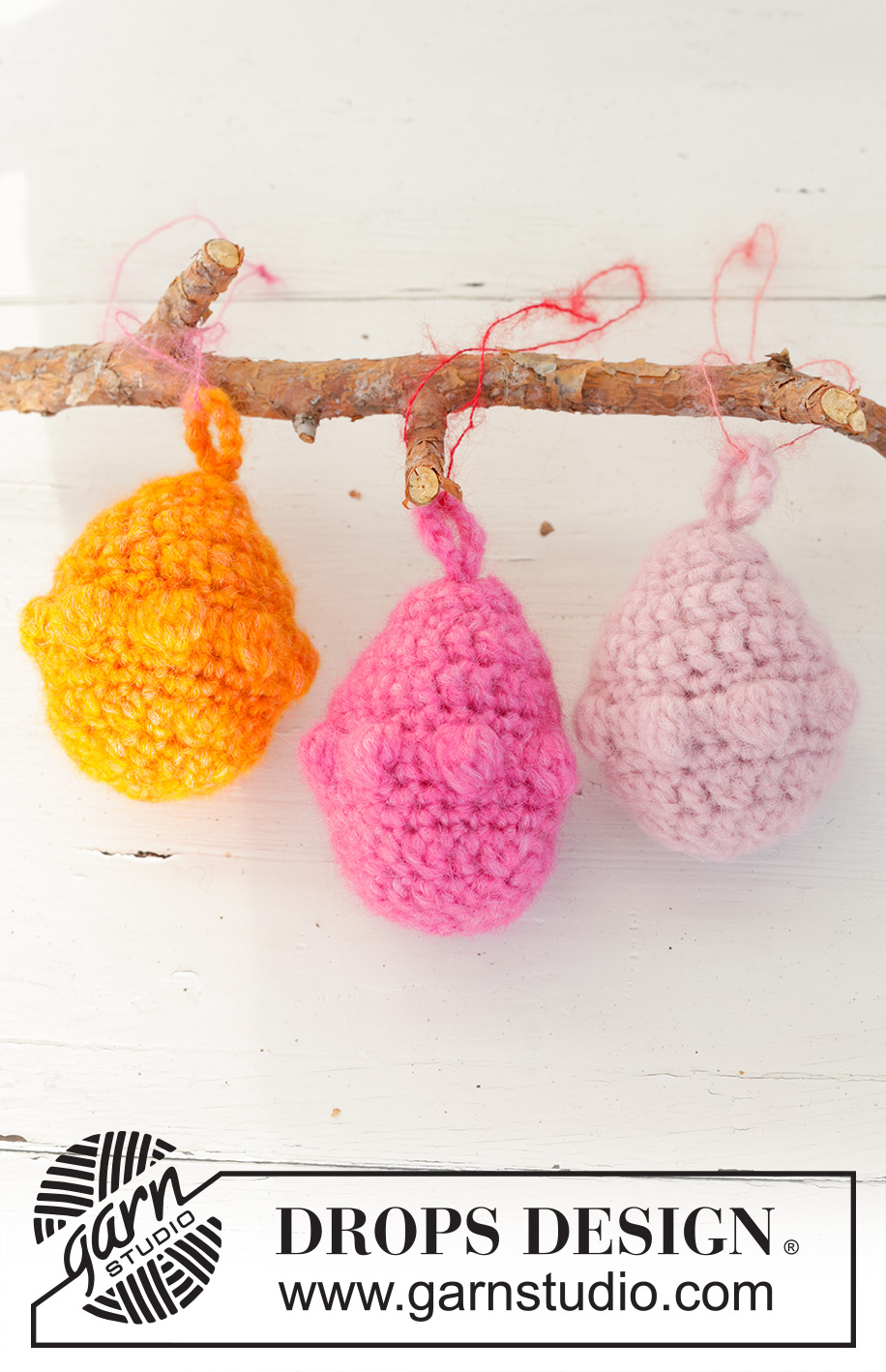 Easter Eggs / DROPS Extra 0-1597 - Crocheted Easter eggs in DROPS Air. Piece is worked in the round top down with bobbles. Theme: Easter.