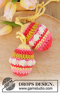 Easter Eggs / DROPS Extra 0-1599 - Crocheted Easter eggs in DROPS Paris. Piece is worked in the round top down with bobbles and stripes. Theme: Easter.