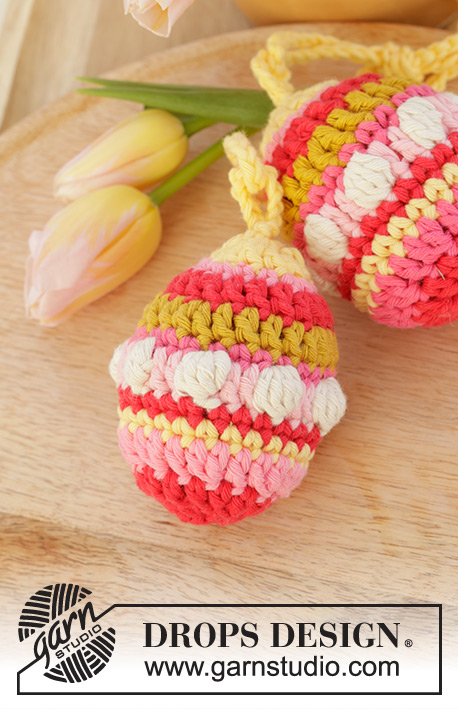 Easter Eggs / DROPS Extra 0-1599 - Crocheted Easter eggs in DROPS Paris. Piece is worked in the round top down with bobbles and stripes. Theme: Easter.