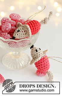 Mistletoe Mice / DROPS Extra 0-1604 - Crocheted mouse/Christmas decoration in DROPS Safran. The piece is worked in the round, from nose to tail. Theme: Christmas.