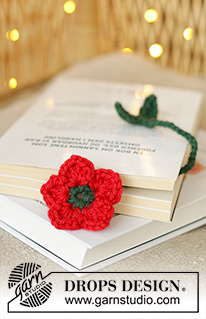 Flower Quotes / DROPS Extra 0-1618 - Heklet bokmerke med blomst i DROPS Nepal. Stilken hekles nedenfra og opp, deretter hekles blomsten rundt fra midten og ut. Tema: Jul.