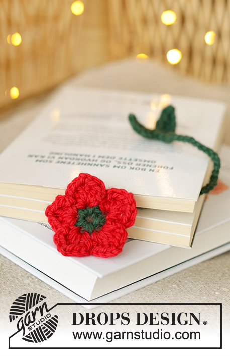 Flower Quotes / DROPS Extra 0-1618 - Heklet bokmerke med blomst i DROPS Nepal. Stilken hekles nedenfra og opp, deretter hekles blomsten rundt fra midten og ut. Tema: Jul.