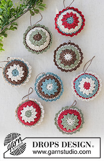 Vintage Vibe Baubles / DROPS Extra 0-1633 - Virkad julkula / julpynt i DROPS Safran. Arbetet virkas i 2 delar runt från mitten och ut. Tema: Jul.