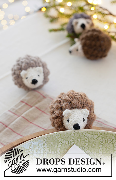 Holiday Hedges / DROPS Extra 0-1637 - Crocheted hedgehog/Christmas decoration in DROPS Lima. Piece is worked in the round from the snout and towards the back with pouf stitches. Theme: Christmas.