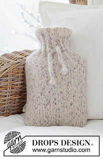 Shimmering Snow Cover / DROPS Extra 0-1641 - Knitted cover for hot-water bottle in DROPS Fabel and DROPS Melody. Piece is knitted bottom up in stocking stitch. Theme: Christmas.