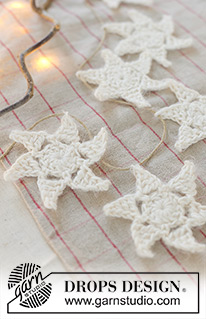 Milky Way Garland / DROPS Extra 0-1642 - Stella / decorazione di Natale in DROPS Muskat e DROPS Brushed Alpaca Silk. Lavorata in tondo dal centro verso l’esterno. Tema: Natale.