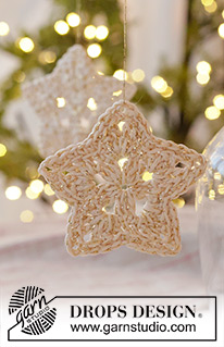 Enchanted Wish / DROPS Extra 0-1647 - Crocheted star/Christmas decoration in DROPS Safran and DROPS Glitter. The piece is worked in the round, middle outwards. Theme: Christmas.
