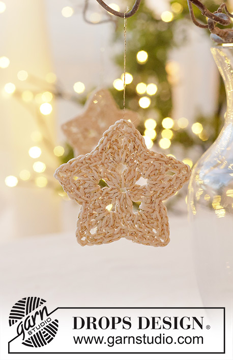 Enchanted Wish / DROPS Extra 0-1647 - Crocheted star/Christmas decoration in DROPS Safran and DROPS Glitter. The piece is worked in the round, middle outwards. Theme: Christmas.