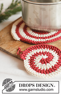 Holiday Swirls / DROPS Extra 0-1670 - Crocheted trivet and pot holder in 2 strands DROPS Paris. Piece is worked in a spiral with 2 colours. Theme: Christmas.