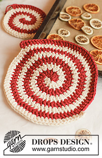 Holiday Swirls / DROPS Extra 0-1670 - Crocheted trivet and pot holder in 2 strands DROPS Paris. Piece is worked in a spiral with 2 colours. Theme: Christmas.
