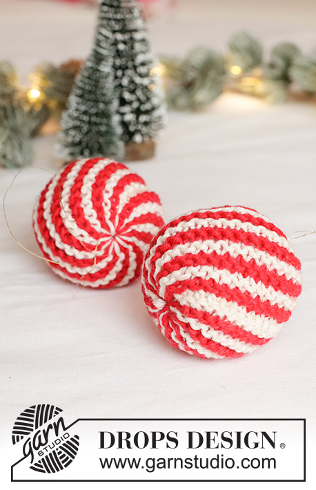 Merry Mints / DROPS Extra 0-1671 - Bombka na drutach z włóczki DROPS Cotton Merino. Przerabiana w tę i z powrotem ściegiem francuskim i w paski/ w spiralę. Temat: Boże Narodzenie.