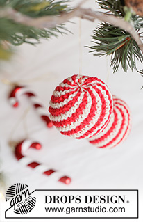 Merry Mints / DROPS Extra 0-1671 - Bombka na drutach z włóczki DROPS Cotton Merino. Przerabiana w tę i z powrotem ściegiem francuskim i w paski/ w spiralę. Temat: Boże Narodzenie.