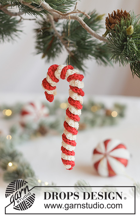 Holiday Treat / DROPS Extra 0-1675 - Crocheted sugar cane/Christmas decoration in DROPS Muskat. Piece is worked in a spiral with treble crochets. Theme: Christmas.
