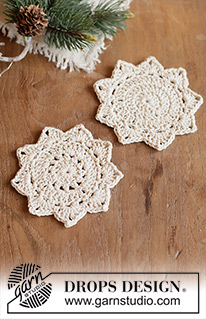 Holiday Glow Coaster / DROPS Extra 0-1685 - Horgolt csillag formájú poháralátét DROPS Bomull Lin fonalból Téma: Karácsony és Újév