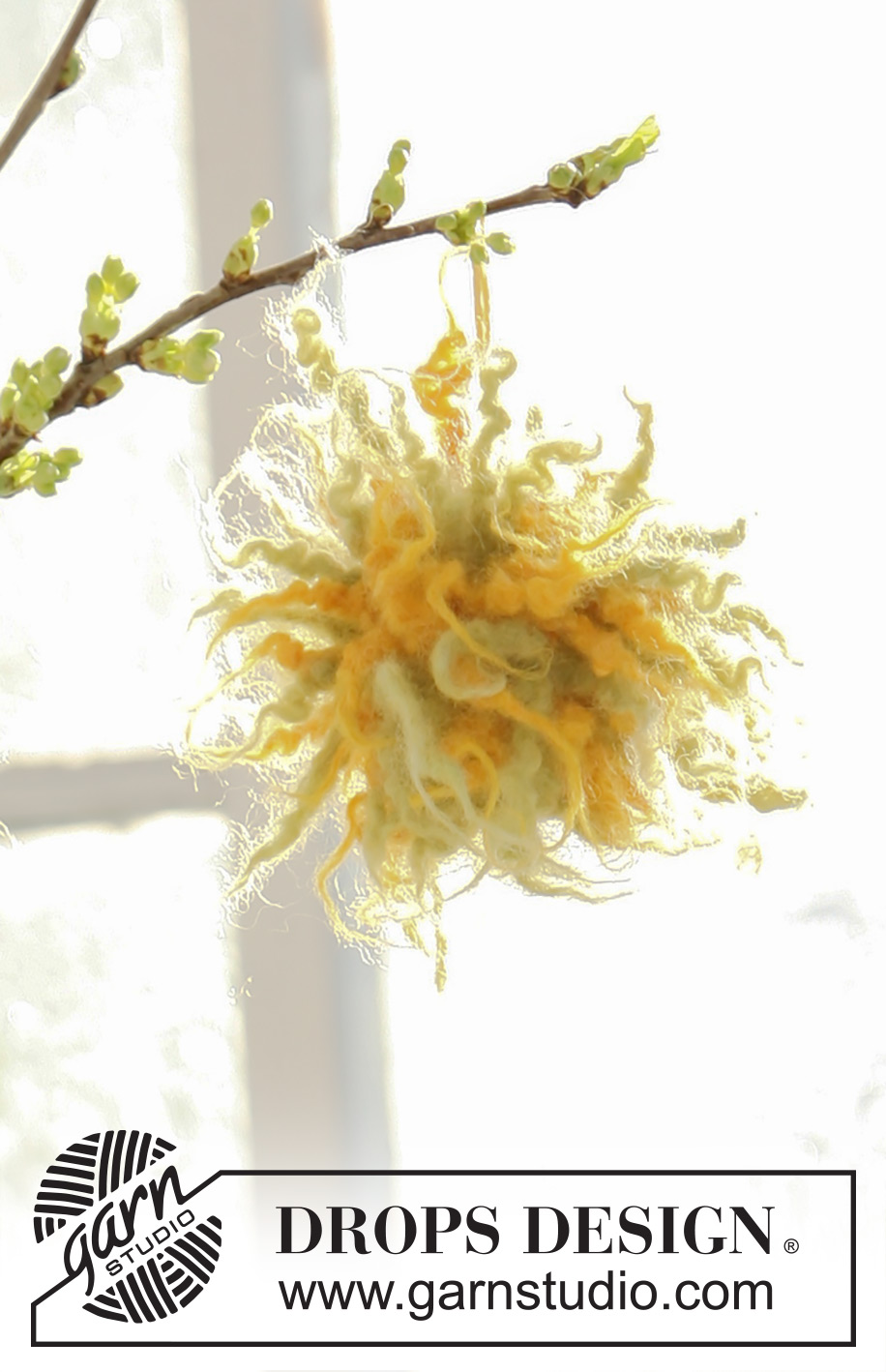 Floral Fireworks / DROPS Extra 0-507 - Gefilzter DROPS Osterbommel in ”Snow”.