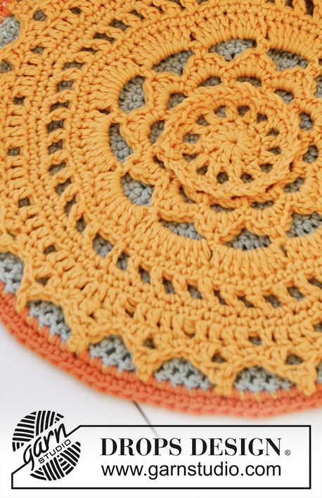 Easter Radiance Doily / DROPS Extra 0-843 - Heklet DROPS gryteklut  i ”Safran” eller DROPS ♥ You #7.