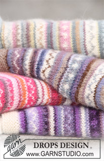 Valeria Grey / DROPS 108-60 - DROPS jacket in ”Alpaca” with round yoke and multi colored pattern. Long or short sleeves. With suggested alternative color combinations. Size XS - XXL