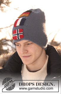 DROPS 110-52 - DROPS hats for men with flags in ”Karisma”, worked from side to side. Yarn alternative ”Merino”. Scarf in ”Alaska”.