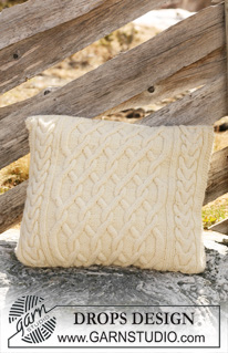 Cabled Dreams / DROPS 117-48 - Strikket DROPS pute med fletter i ”Alaska”.