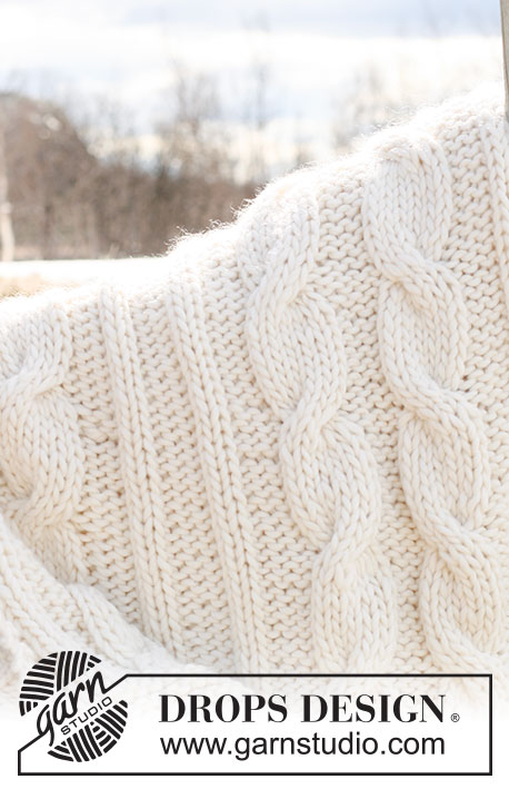 Cuddle Me / DROPS 117-55 - Knitted DROPS blanket in ”Polaris” with cables.