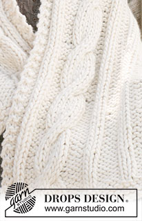 Cuddle Me / DROPS 117-55 - Knitted DROPS blanket in ”Polaris” with cables.