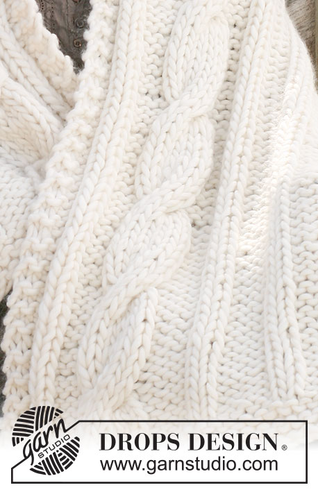 Cuddle Me / DROPS 117-55 - Knitted DROPS blanket in ”Polaris” with cables.