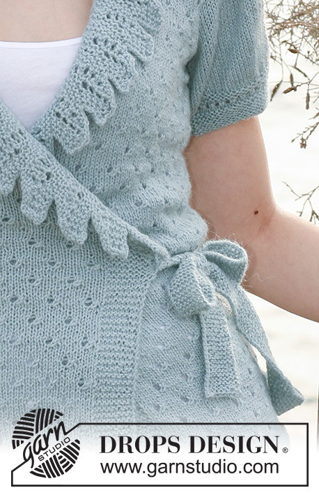 Queen of Ruffles / DROPS 119-23 - DROPS omslagsjakke i ”Alpaca” med blonde langs forstykkene og korte puffermer. 
Str: S til XXXL
