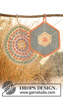 Sweet Kaleidoscope Potholders / DROPS 120-52 - Crochet DROPS pot holders, 1 round with bobbles and 1 hexagon pot holder, in ”Paris”.