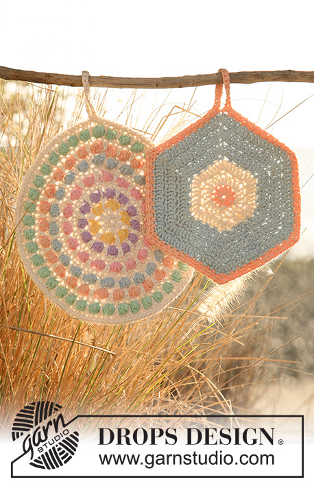 Sweet Kaleidoscope Potholders / DROPS 120-52 - Crochet DROPS pot holders, 1 round with bobbles and 1 hexagon pot holder, in ”Paris”.