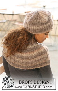 DROPS 125-14 - De set bevat: Gebreide DROPS muts en halswarmer in gedraaide boordsteek van ”Delight” en ”Kid-Silk”. 

