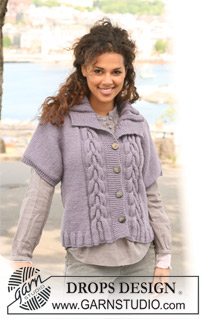Say it with Cables / DROPS 126-23 - Cardigan DROPS de punto con mangas cortas y torsadas / trenzas en “Nepal”. Talla S – XXXL.
Diseño DROPS: Patrón No. NE-029
