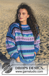 Nile Horizons / DROPS 13-13 - DROPS trøje i Paris med bort-mønster i dame- og herrestr.
DROPS design: Model nr W-052