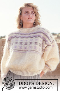 Touch of Sand / DROPS 13-5 - DROPS jumper in “Vienna” or Melody. Size S-L.