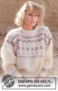 Touch of Sand / DROPS 13-5 - DROPS jumper in “Vienna” or Melody. Size S-L.
