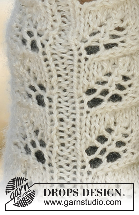 Autumn Leaves / DROPS 133-33 - Gestrickte DROPS Pulswärmer mit Lochmuster in “Alpaca”.