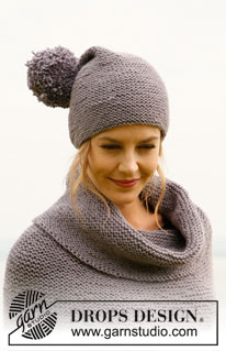 Pompom / DROPS 134-15 - Knitted DROPS hat in garter st with pompom and poncho with fringes and large collar in ”Nepal”. Size: S to XXXL  
