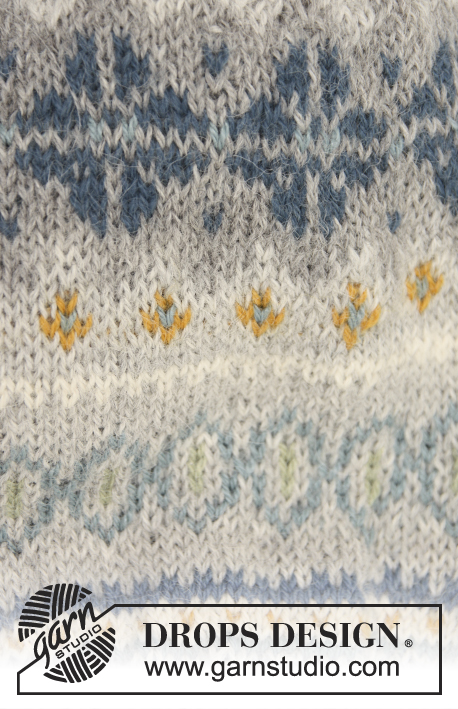 Autumn Aurora / DROPS 143-28 - Set consist of: Knitted DROPS poncho, hat and wrist warmers with fair-isle pattern in ”Alpaca”. Size: S - XXXL.