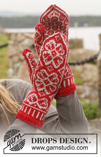 Winter Rose Gloves / DROPS 150-3 - Gestrickte DROPS HANDSCHUHE aus „Karisma“ mit Norwegermuster.