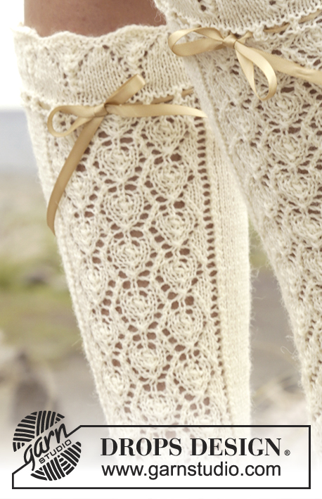 Marie Antoinette / DROPS 167-33 - Knitted DROPS knee socks with lace pattern in Fabel. Size 35 - 43